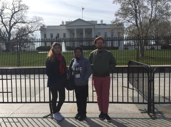 Students with Joann Garcia in front of White House