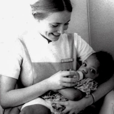 Nurse holding a baby