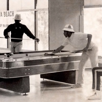 Students playing pool 1970s