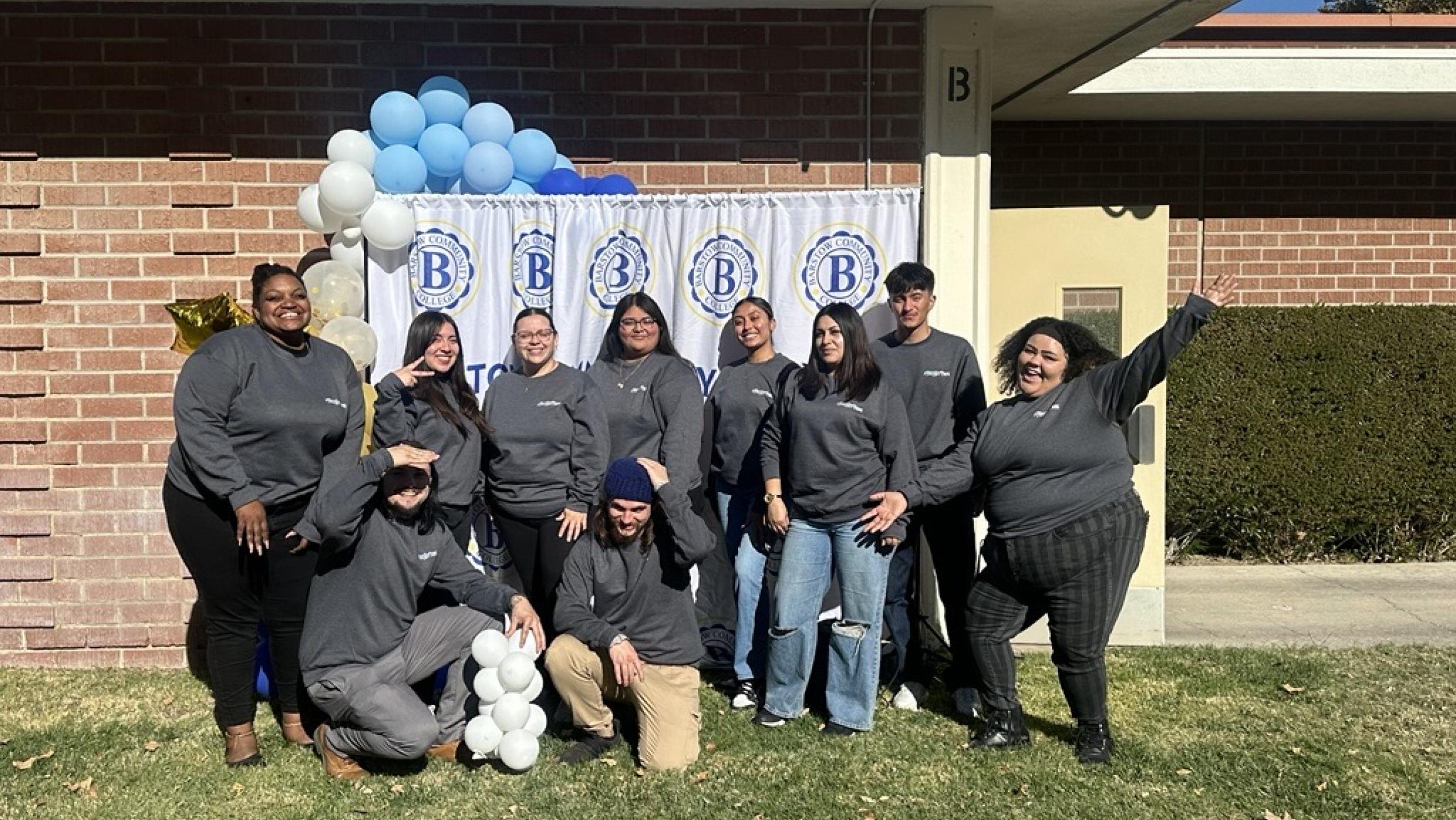 Students and Staff posing for photo