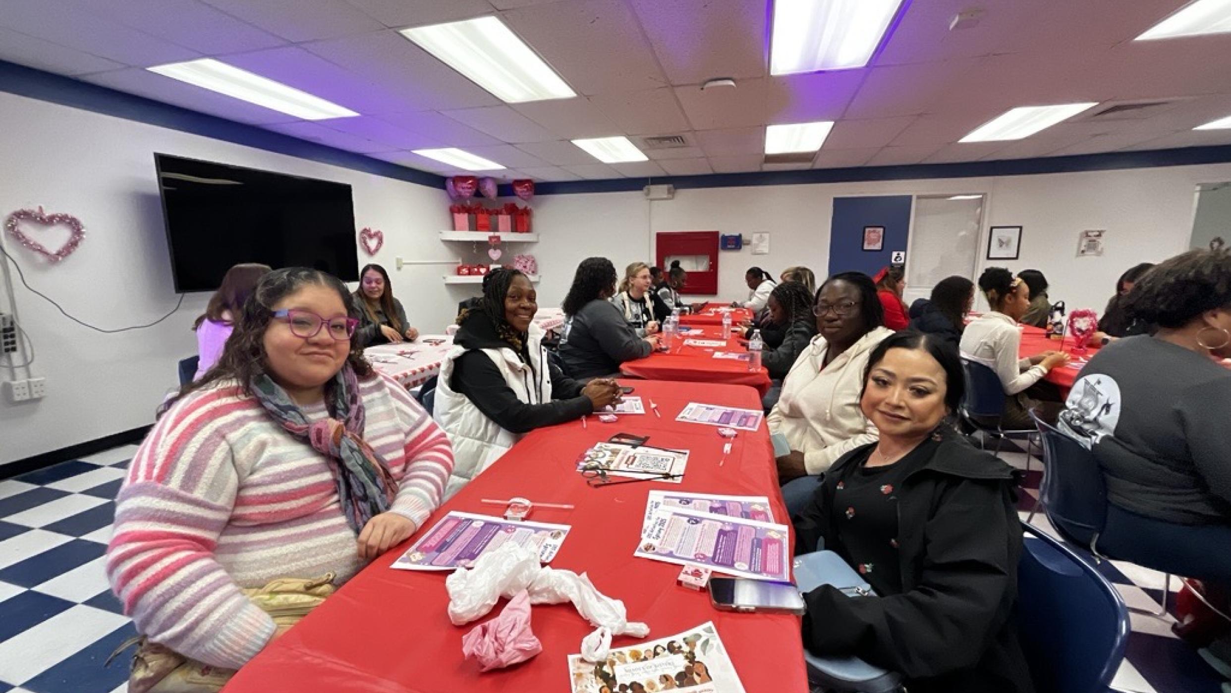 Students Sitting in front of a table in the Viking Lounge