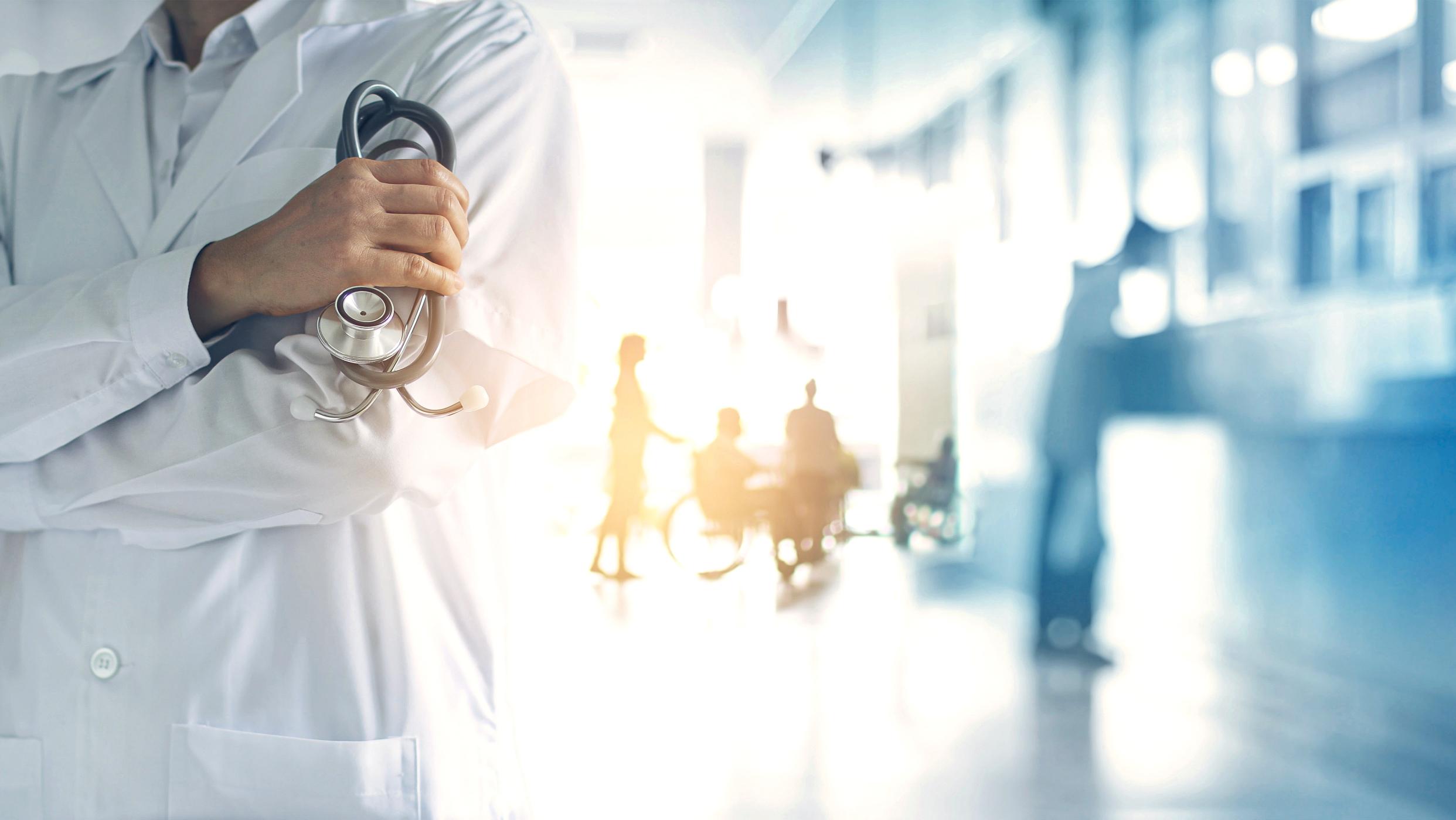 Doctor in a hospital standing with stethoscope 