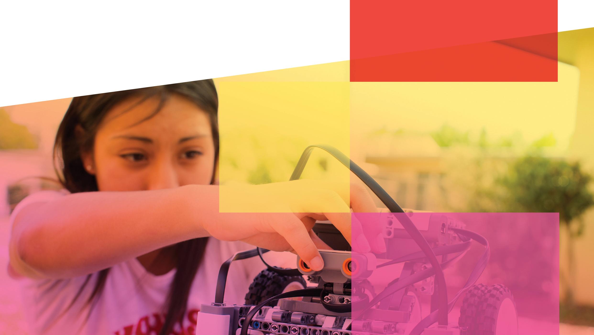 A young woman building a robot, seen through a colorful block overlay.