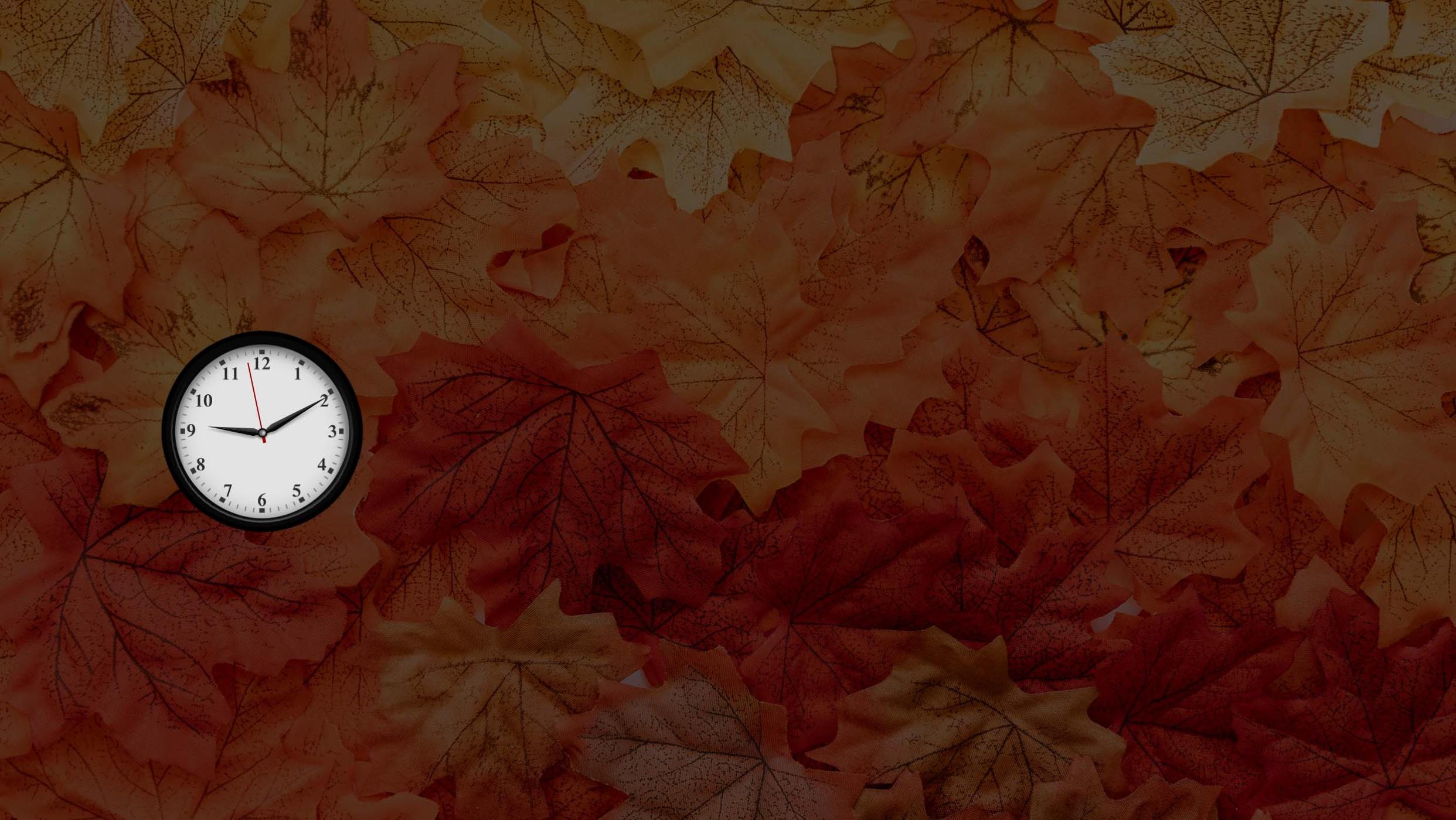 Fall leaves with clock